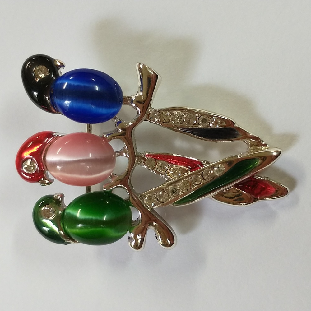 Pin - Multi color imitation tiger eye pin.